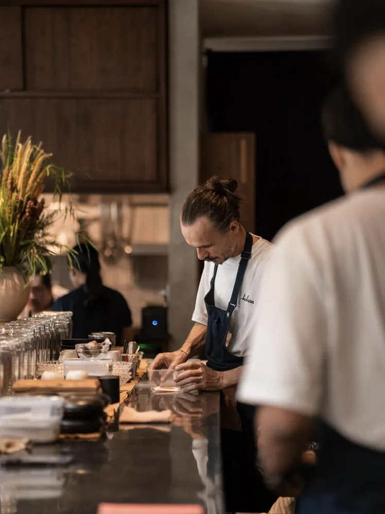 Chef working the pass during service